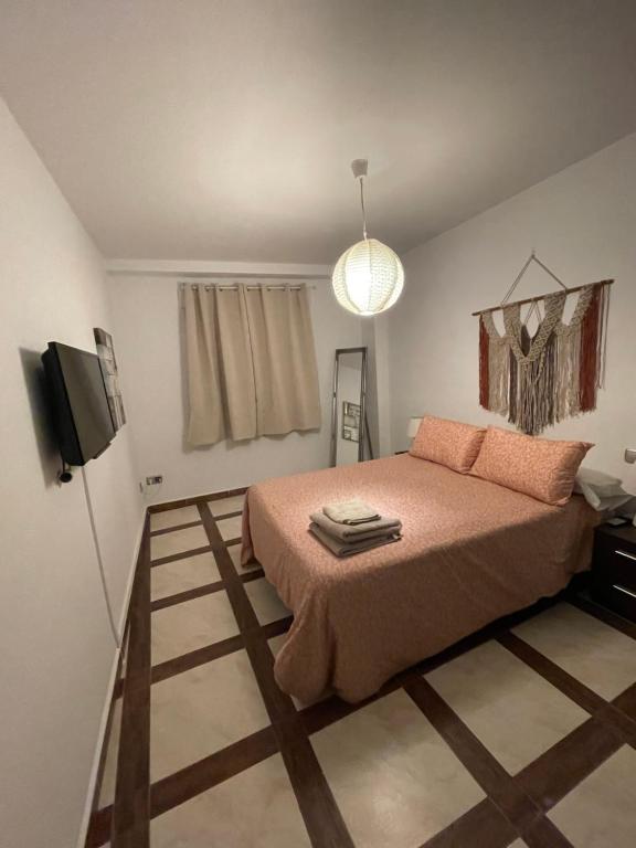 TV a/nebo společenská místnost v ubytování Apartamento de 2 dormitorios cerca Paseo Marítimo