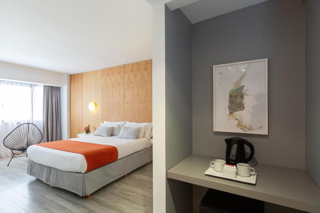 Una cama o camas en una habitación de Deco Collection