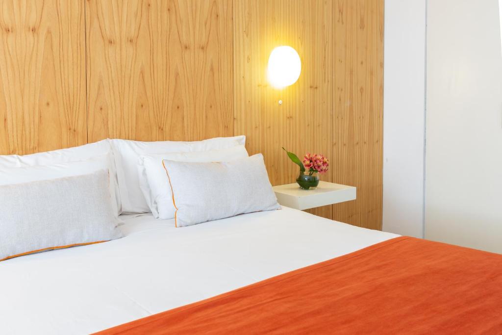Una cama o camas en una habitación de Deco Collection