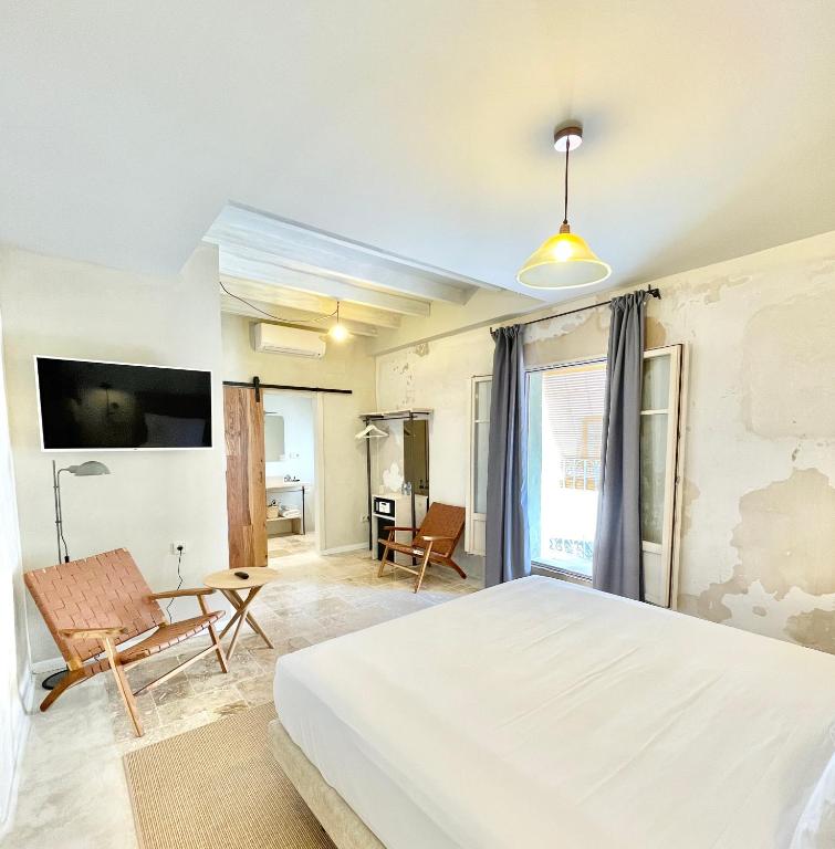 Postel nebo postele na pokoji v ubytování Blue Sardine Hostal Boutique Altea