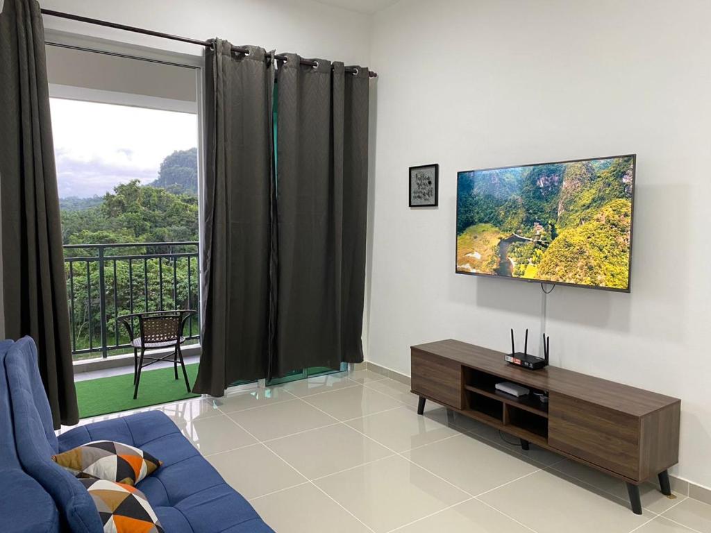 Et tv og/eller underholdning på Homestay Sandakan CLL