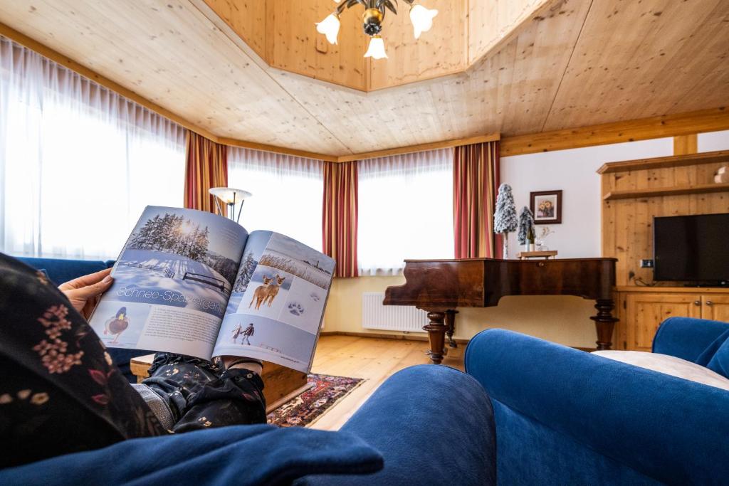 TV a/nebo společenská místnost v ubytování Hotel Breitlehenalm