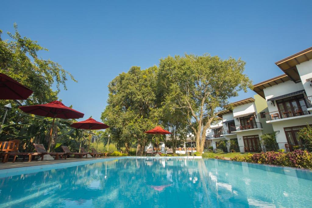 Bazén v ubytování Sigiriya Wewa Addara Hotel - Hotel By The Lake nebo v jeho okolí