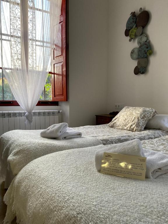 Postel nebo postele na pokoji v ubytování El Balcón del Eume, Cantina Río Covés