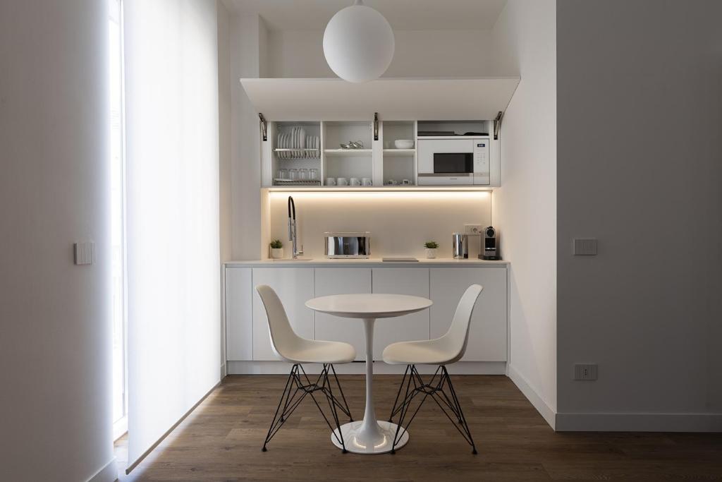 Kuchyňa alebo kuchynka v ubytovaní Fiorentini Residence MILANO