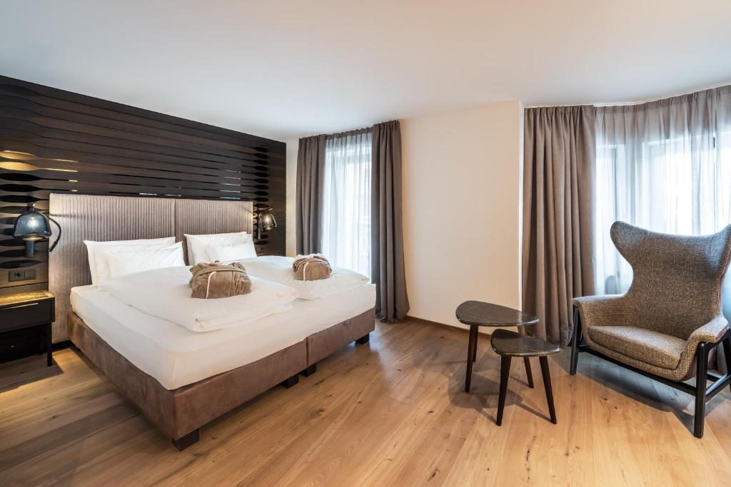 Postel nebo postele na pokoji v ubytování Stella Hotel - My Dolomites Experience