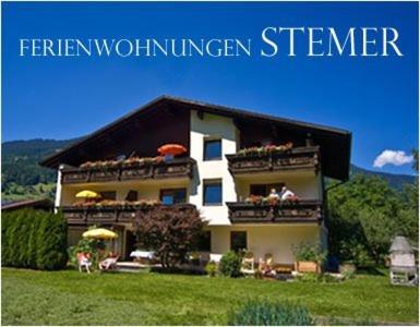 a picture of a house with the words fern wolfensteinsteinstraffen at Ferienwohnungen Stemer in Schruns