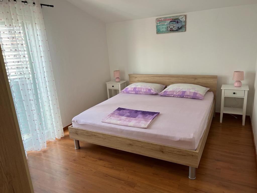 Postel nebo postele na pokoji v ubytování Vila Rosanda