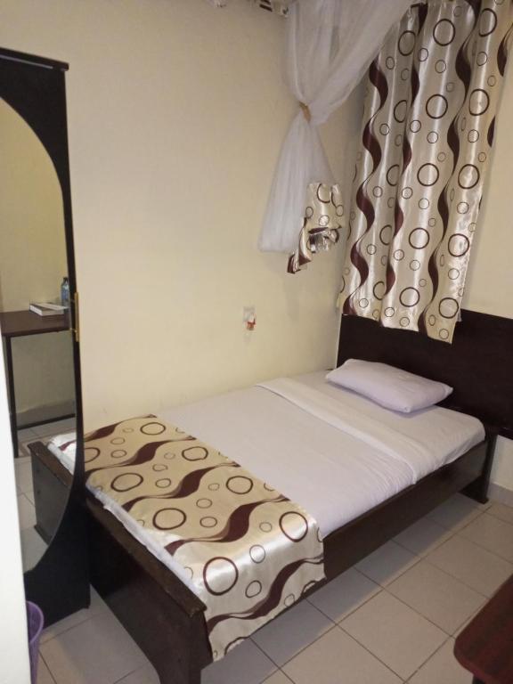 Postel nebo postele na pokoji v ubytování Beach View Hotel - Kisumu