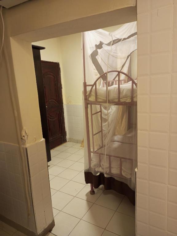 Postel nebo postele na pokoji v ubytování Beach View Hotel - Kisumu
