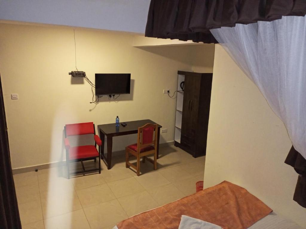 TV a/nebo společenská místnost v ubytování Beach View Hotel - Kisumu