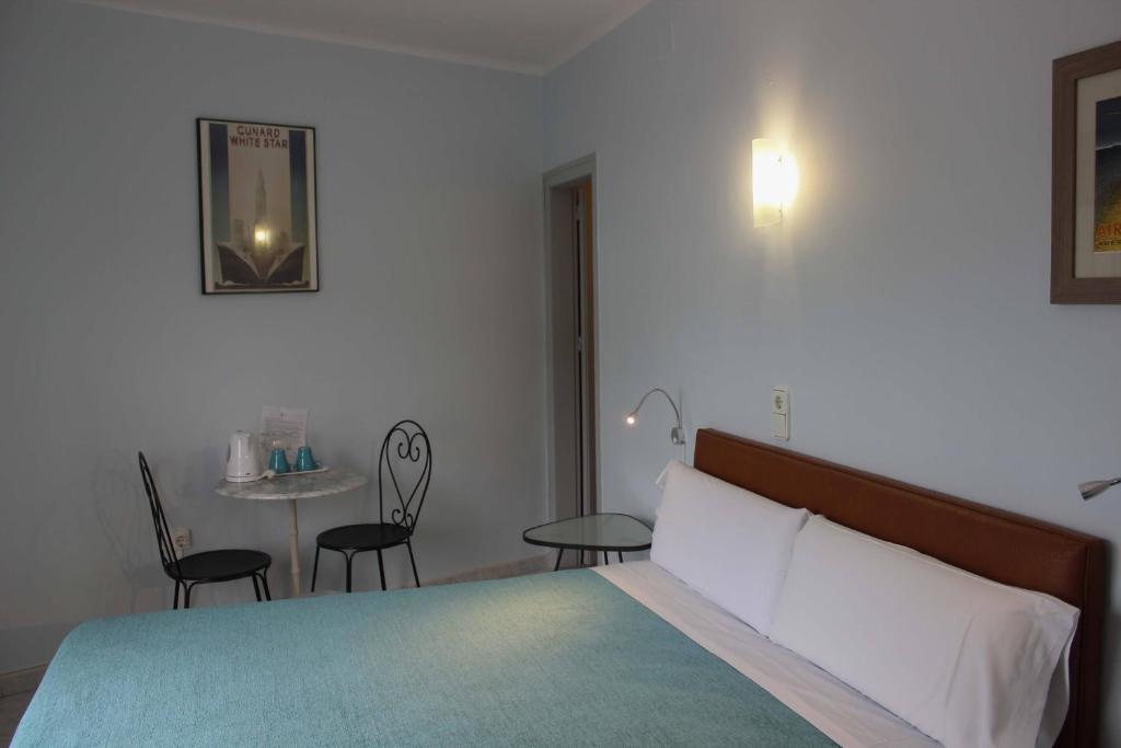Postel nebo postele na pokoji v ubytování Hotel Alexandra Sitges