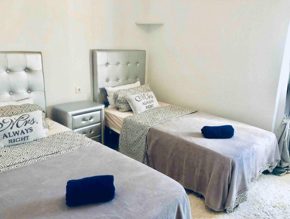 Postel nebo postele na pokoji v ubytování Apartamentos Yanina Gran Alacant