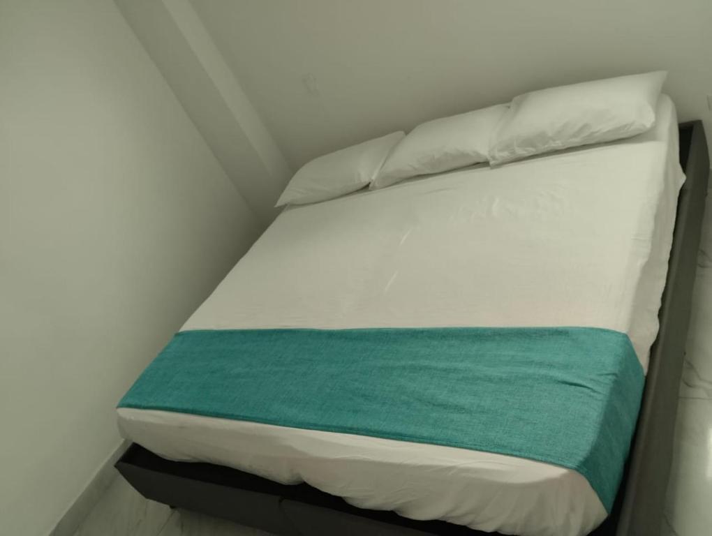 Postel nebo postele na pokoji v ubytování Sky view hotel tolu
