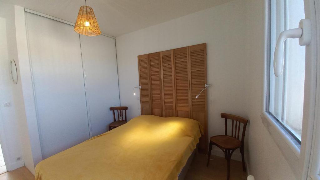 Posteľ alebo postele v izbe v ubytovaní LA PEROUSE - Appartement 4ème étage - 2 chambres vue mer