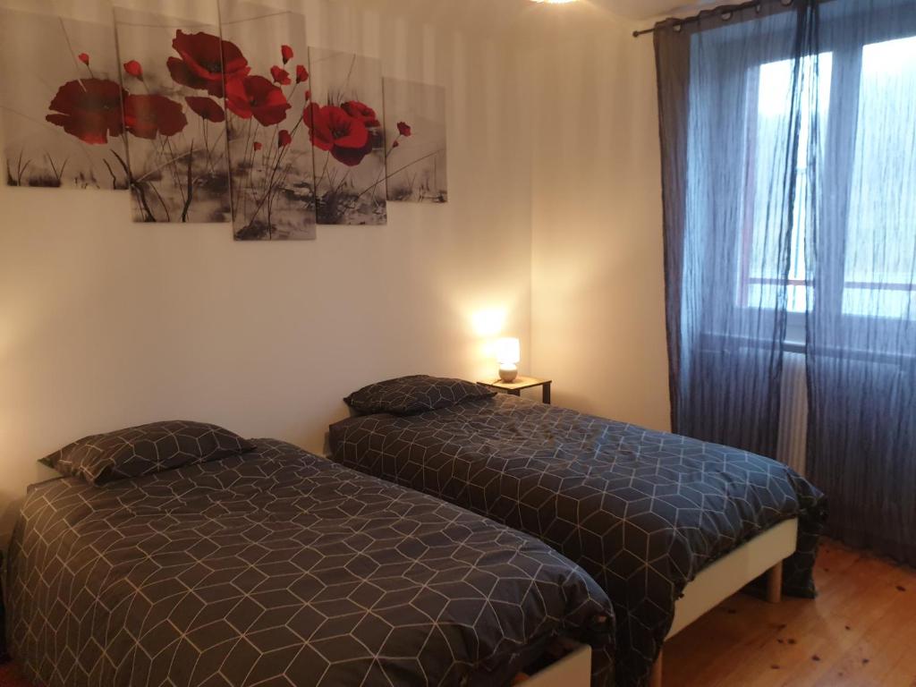 Postel nebo postele na pokoji v ubytování sas Road Runner Café