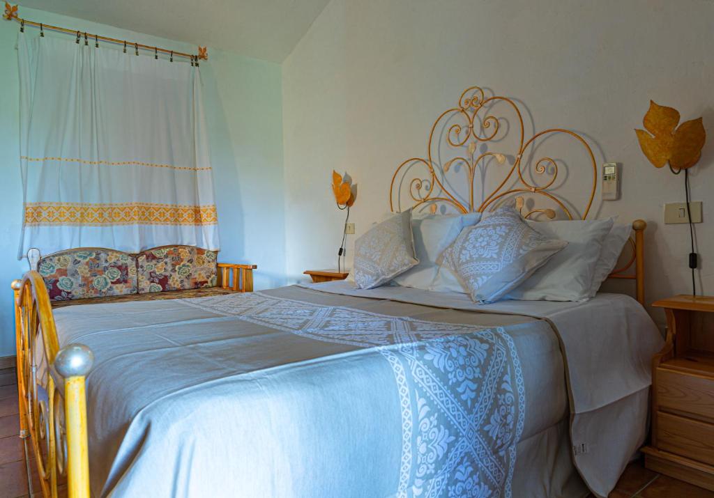 Letto o letti in una camera di Turismo Rurale CUDACCIOLU