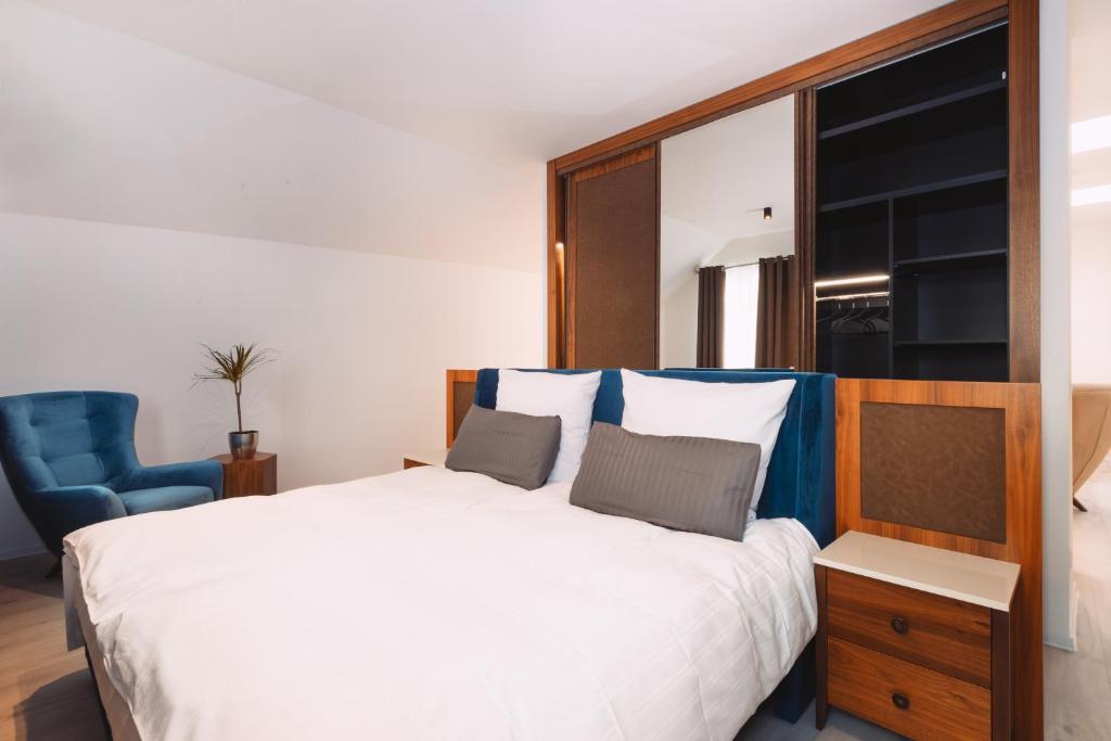 Postel nebo postele na pokoji v ubytování Loft Suite im modernen Style in Schärding