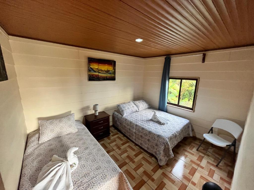 Ένα ή περισσότερα κρεβάτια σε δωμάτιο στο Casa Bonanza