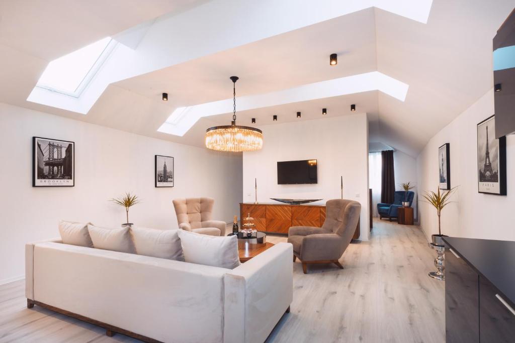 TV a/nebo společenská místnost v ubytování Loft Suite im modernen Style in Schärding
