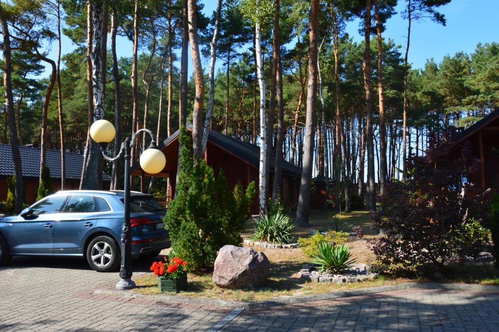 Vonkajšia záhrada v ubytovaní Domki przy plaży - Pod Wydmami