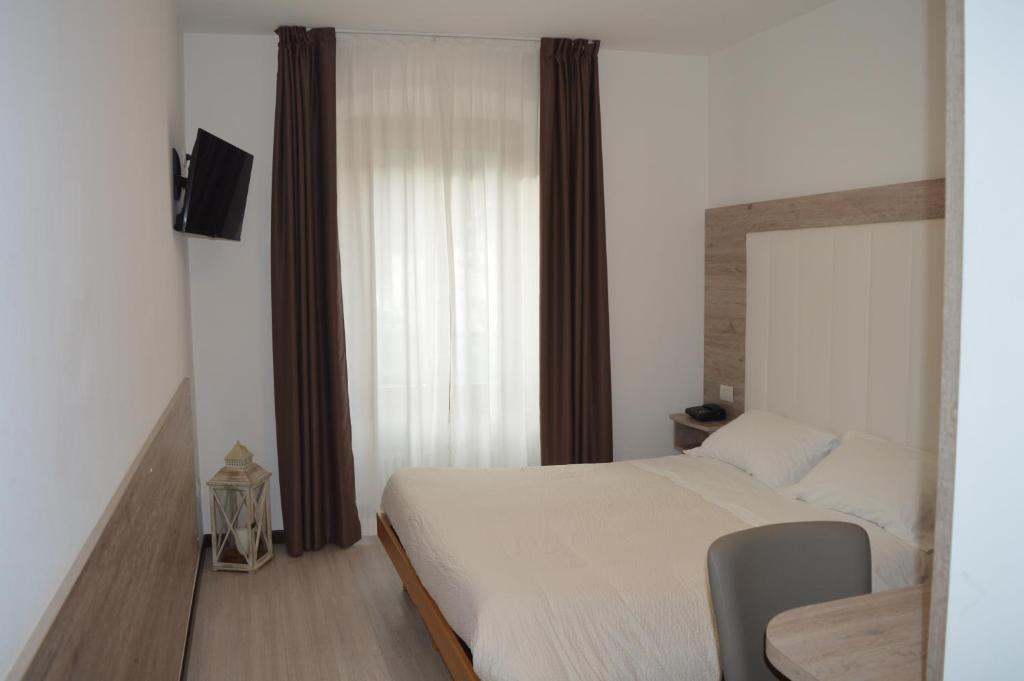 TV a/nebo společenská místnost v ubytování Albergo Ristorante Da Neni