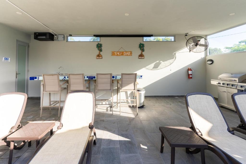 Posezení v ubytování Aquaville Dorado Moderna Villa 3