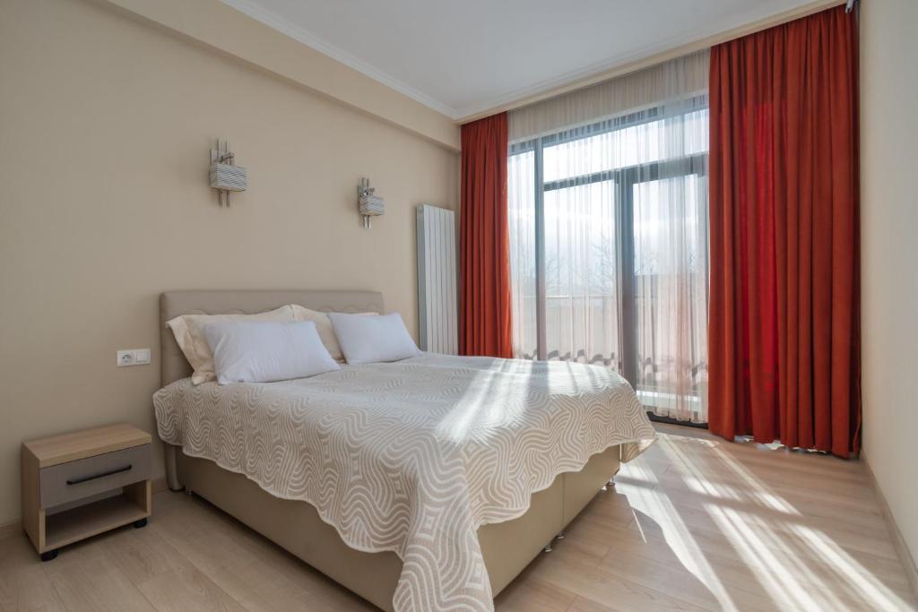 Postel nebo postele na pokoji v ubytování Hotel Alexandria