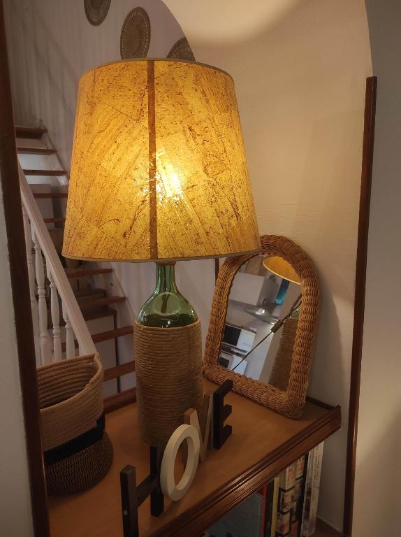 a lamp sitting on top of a table at Chill Out Cabanon Coeur Calanques in Marseille