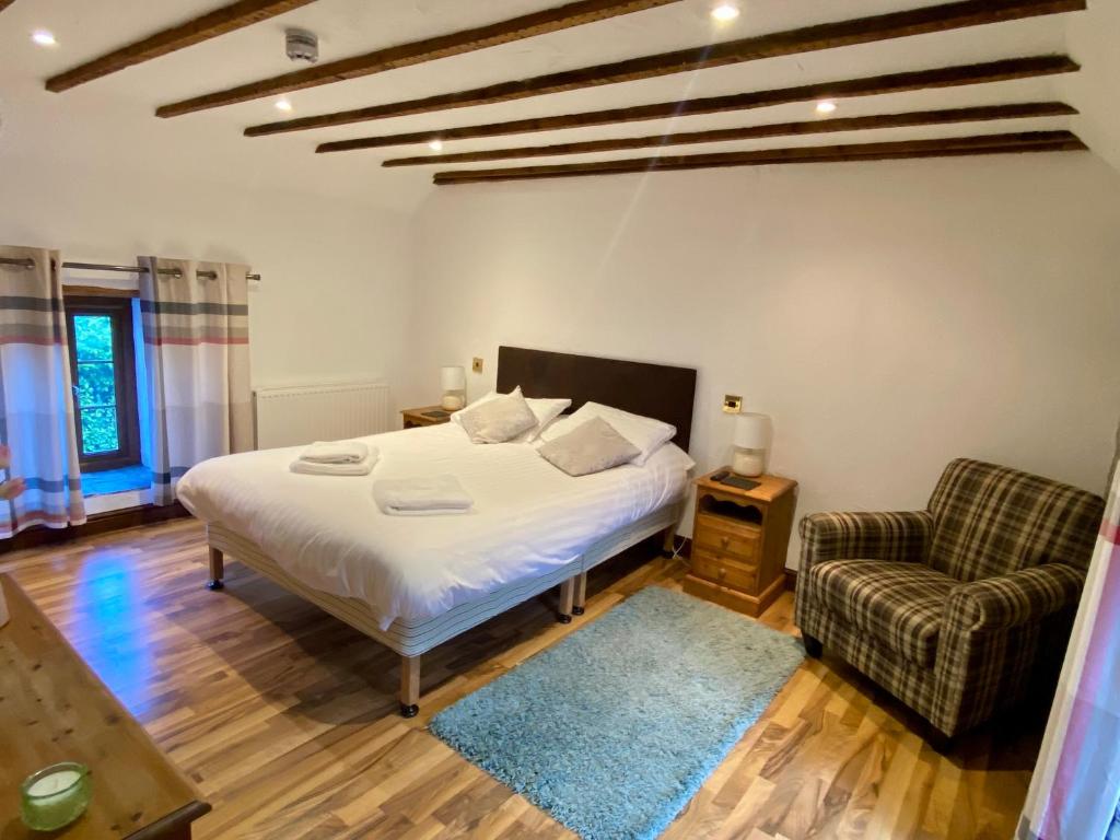 Postel nebo postele na pokoji v ubytování Seven Stars Inn