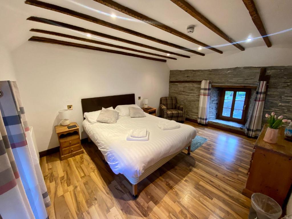 Postel nebo postele na pokoji v ubytování Seven Stars Inn