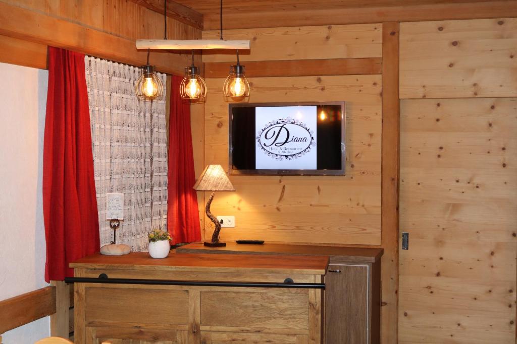 TV a/nebo společenská místnost v ubytování Hotel & Restaurant Diana