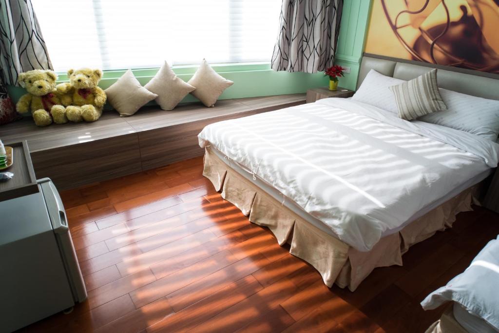 Postel nebo postele na pokoji v ubytování Bei Pin B&B