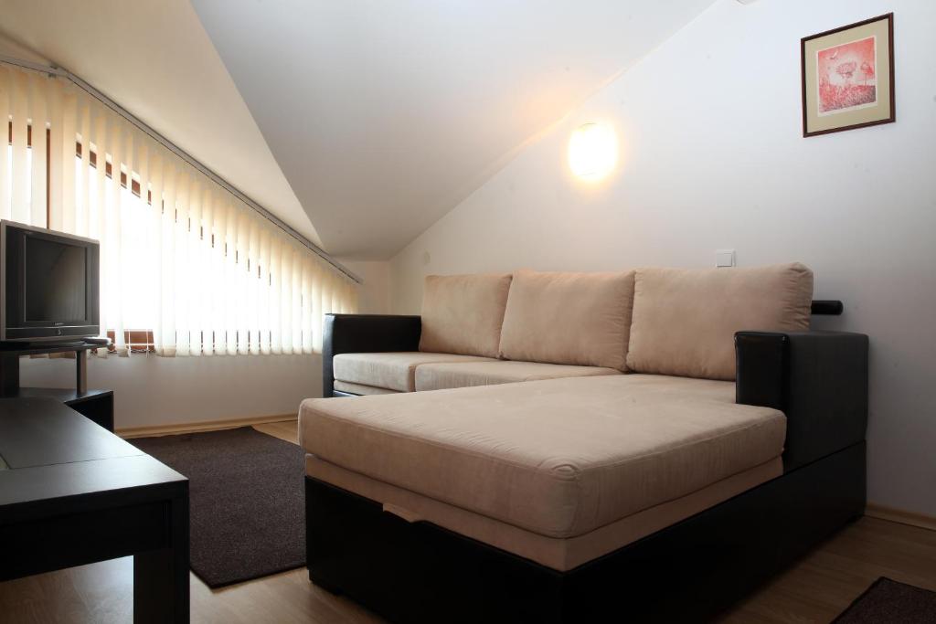 Postel nebo postele na pokoji v ubytování Guest House Koncheto