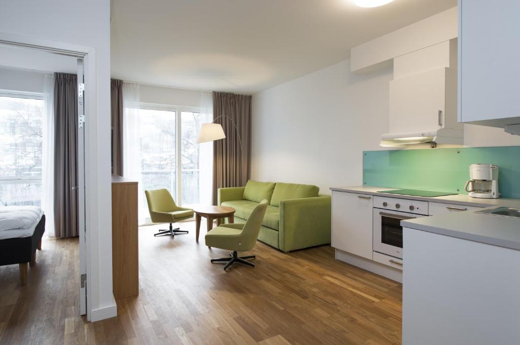 Kuchyň nebo kuchyňský kout v ubytování Thon Hotel Sandven