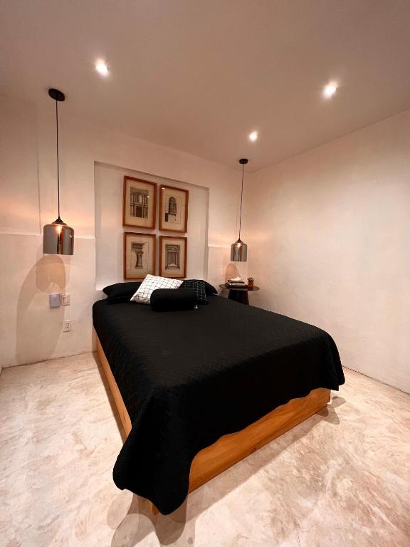 Postel nebo postele na pokoji v ubytování Hotel Atia