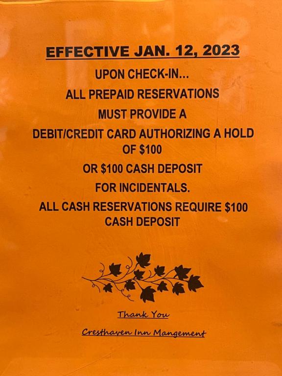 een poster van een ticket voor open inchecken bij Cresthaven Inn Jamaica-JFK in Queens