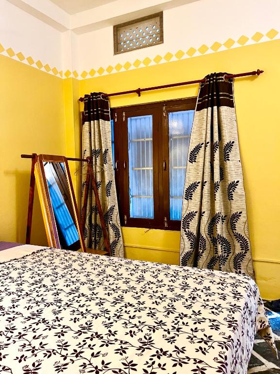 Postel nebo postele na pokoji v ubytování Paris Guest House