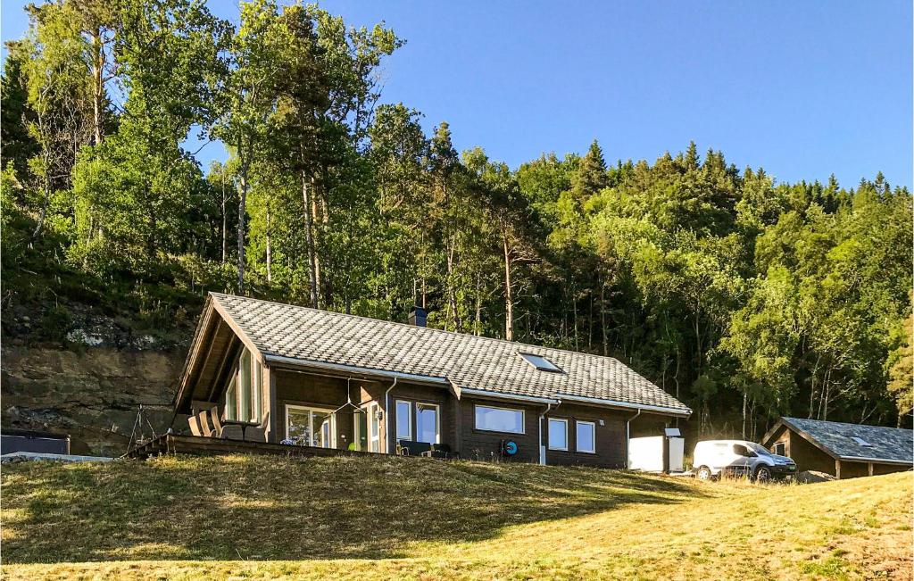 a small house on top of a hill at 5 Bedroom Gorgeous Home In Vikedal in Vikedal