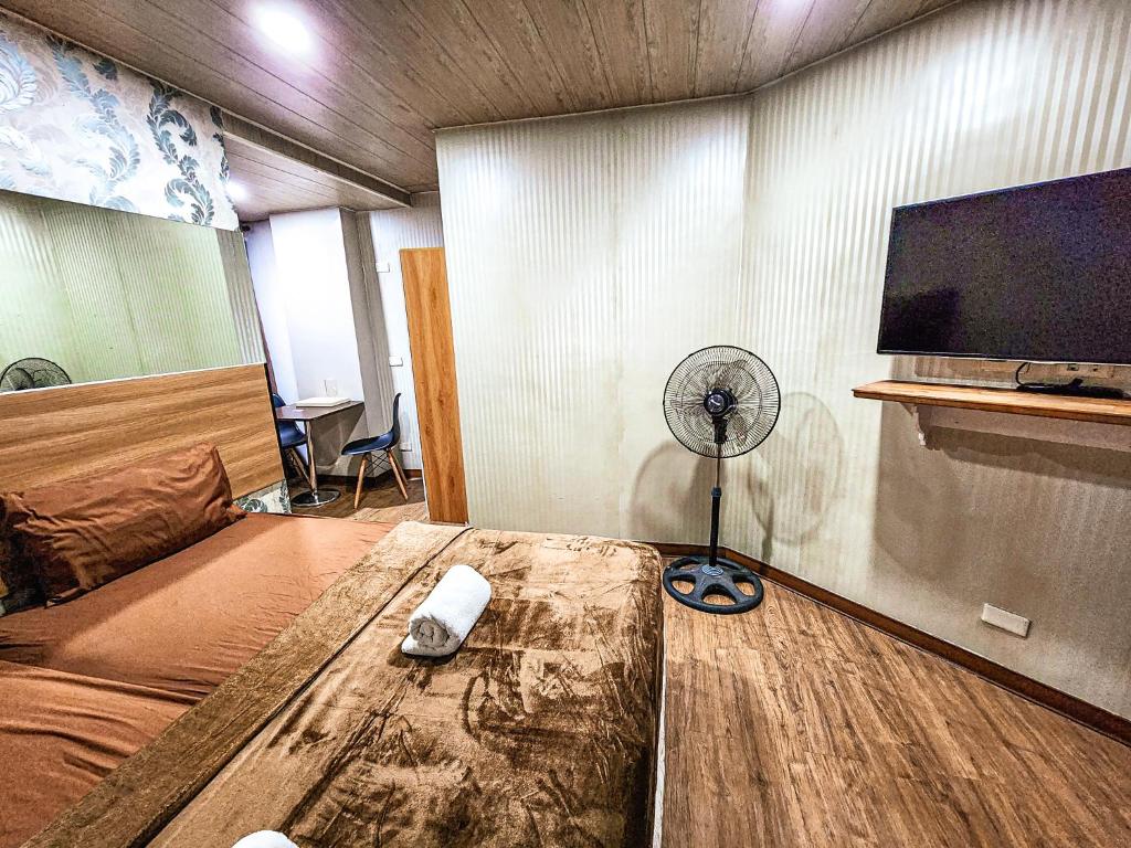 TV a/nebo společenská místnost v ubytování Hotel Urban