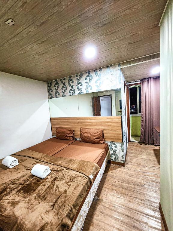 Postel nebo postele na pokoji v ubytování Hotel Urban