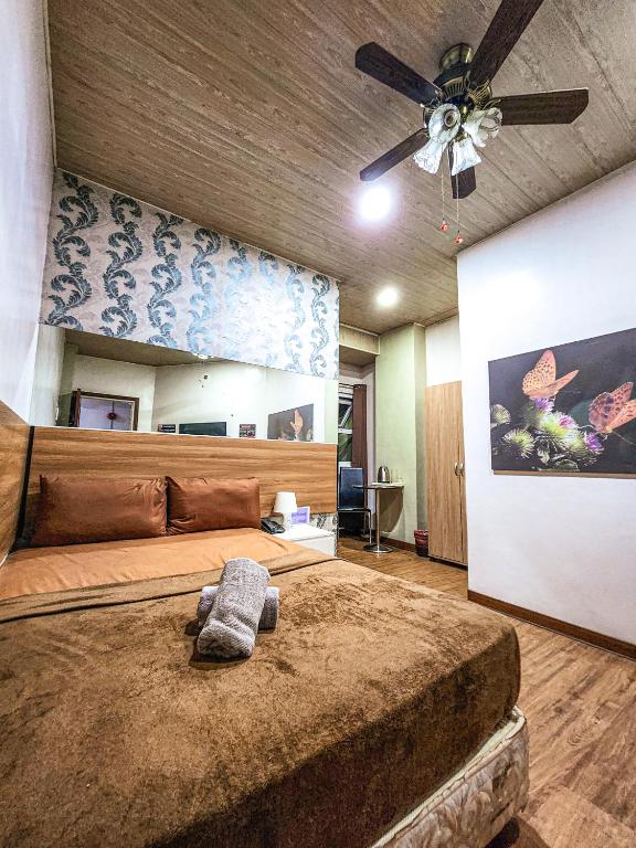 Postel nebo postele na pokoji v ubytování Hotel Urban