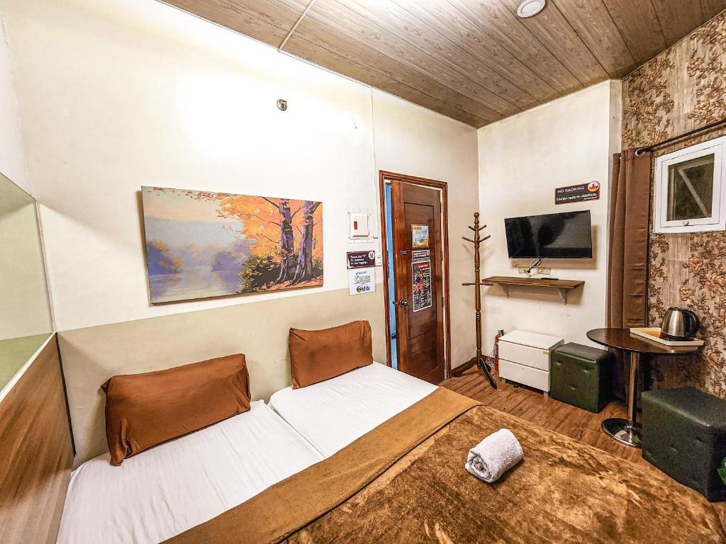 TV a/nebo společenská místnost v ubytování Hotel Urban