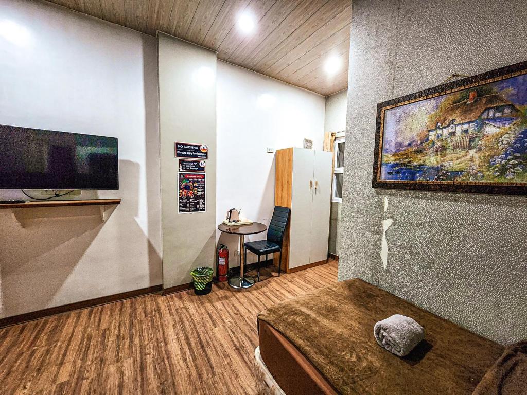 TV a/nebo společenská místnost v ubytování Hotel Urban