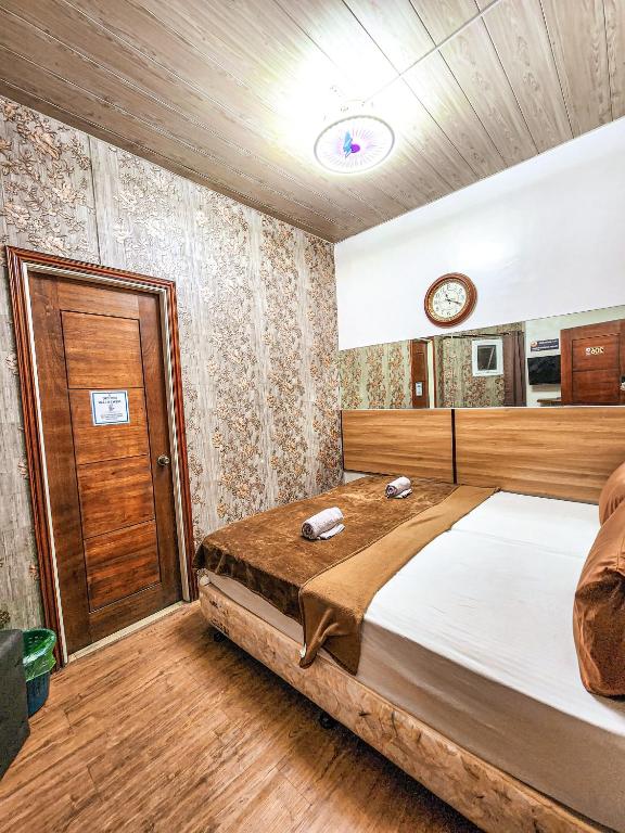 Postel nebo postele na pokoji v ubytování Hotel Urban