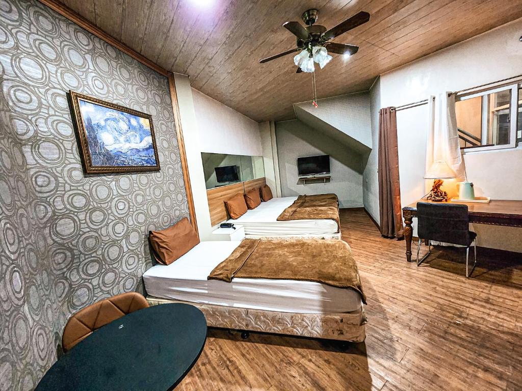 Postel nebo postele na pokoji v ubytování Hotel Urban