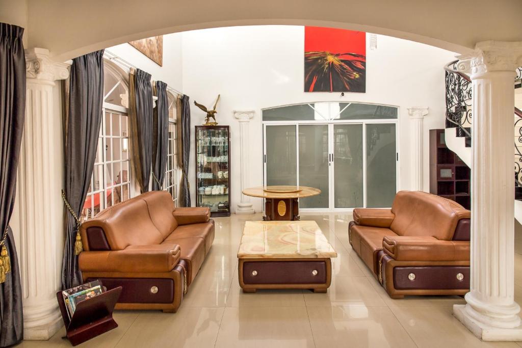 Posezení v ubytování Alameda Cariari Boutique Hotel