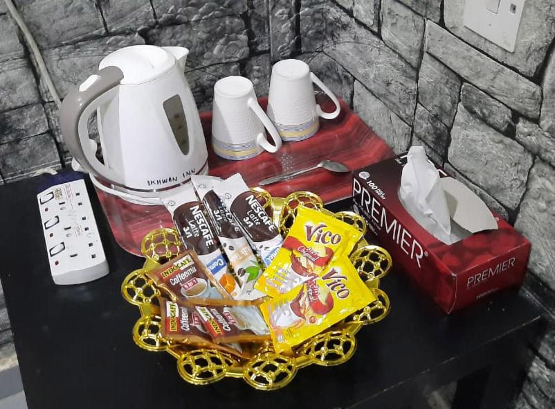 Příslušenství pro přípravu čaje a kávy v ubytování Hotel Aliff Tanjong Malim