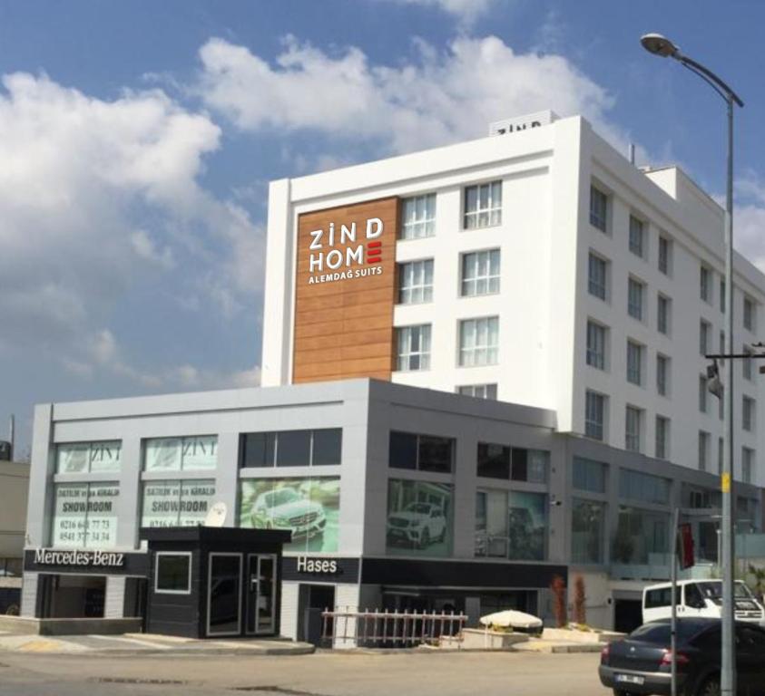 a large white building with a sign on it at Zin D Home Otel Alemdağ in Istanbul