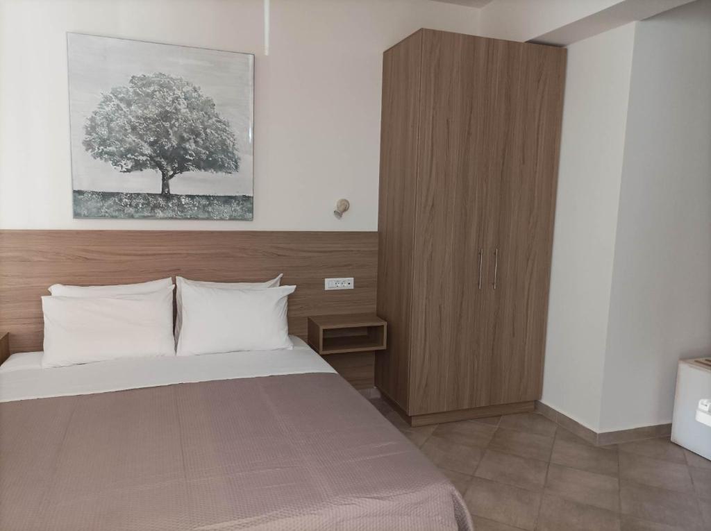 Postel nebo postele na pokoji v ubytování Palaiokastro view